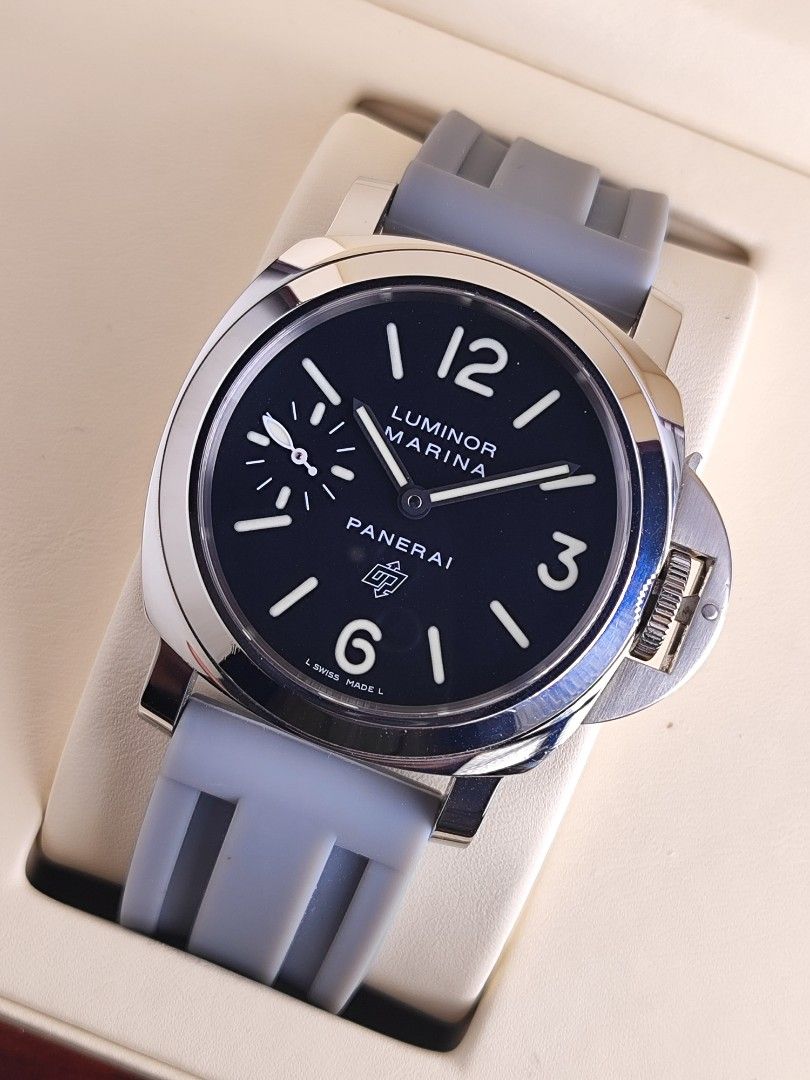 Luminor Marina Panerai 005 (Category: Luxury Watches) located in San Juan City. Submitted by MW_888 (Listing ID 1380850270, Image 1). Description: 2015 Luminor Marina Panerai PAM005 44mm Manual wind 9/10 condition Inclusions: watch, replacement rubber strap with original buckle, replacement gray strap (seen on photo), movement certificate, manual, Panerai guarantee certificate, tool, original box and watch case *photo reference on 6.5" wrist *ori