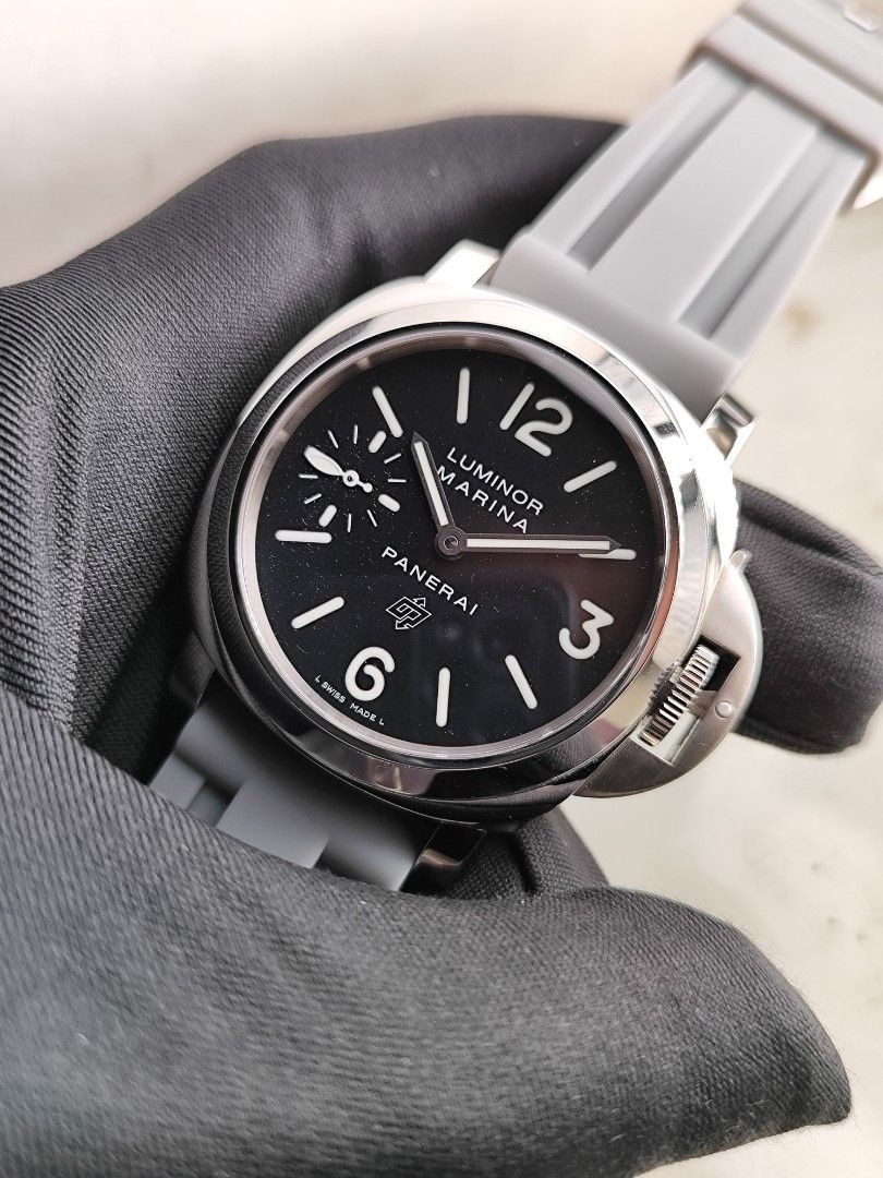 Luminor Marina Panerai 005 (Category: Luxury Watches) located in San Juan City. Submitted by MW_888 (Listing ID 1380850270, Image 3). Description: 2015 Luminor Marina Panerai PAM005 44mm Manual wind 9/10 condition Inclusions: watch, replacement rubber strap with original buckle, replacement gray strap (seen on photo), movement certificate, manual, Panerai guarantee certificate, tool, original box and watch case *photo reference on 6.5" wrist *ori