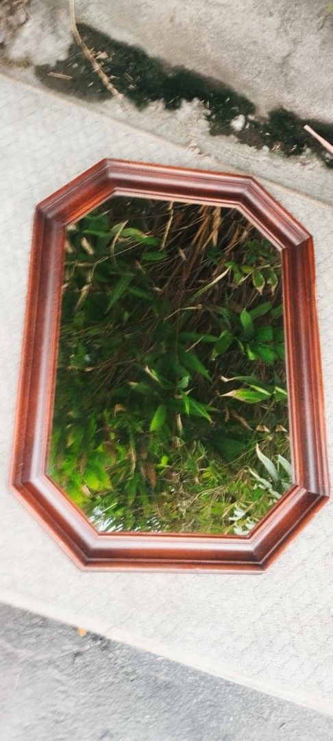 Mirror with wooden frame 8 sides (Category: Mirrors) located in Manila. Submitted by benjie.benjie3 (Listing ID 1380696290, Image 1). Description: Mirror with wooden frame 8 sides NO to COD NO swapping Estimate size H= 27 1/2 inches L= 19 1/2 Inches W= 1 1/2 inches Color = brown Material = wooden frame Made in Japan 2nd hand with scratch No warranty If there's Damage or Issues they can be seen in the last picture Price = 1,800 My location is Mala