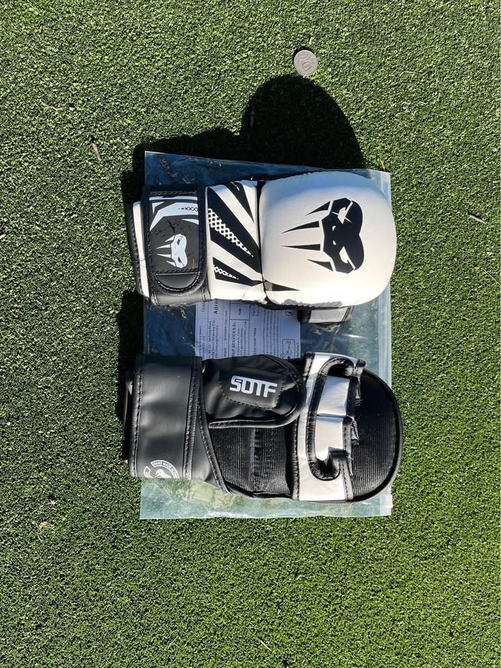 MMA Gloves (Category: Gym & Fitness) located in Blacktown. Submitted by edwards2469 (Listing ID 1380819136, Image 1). Description: MMA gloves which are designed for fighting, sparring and padwork Sweat-resistant inner lining Adjustable straps for the perfect fit One size fits all – unisex design Built for comfort, durability, and power Lightweight with strong knuckle and wrist support Price Negotiable .