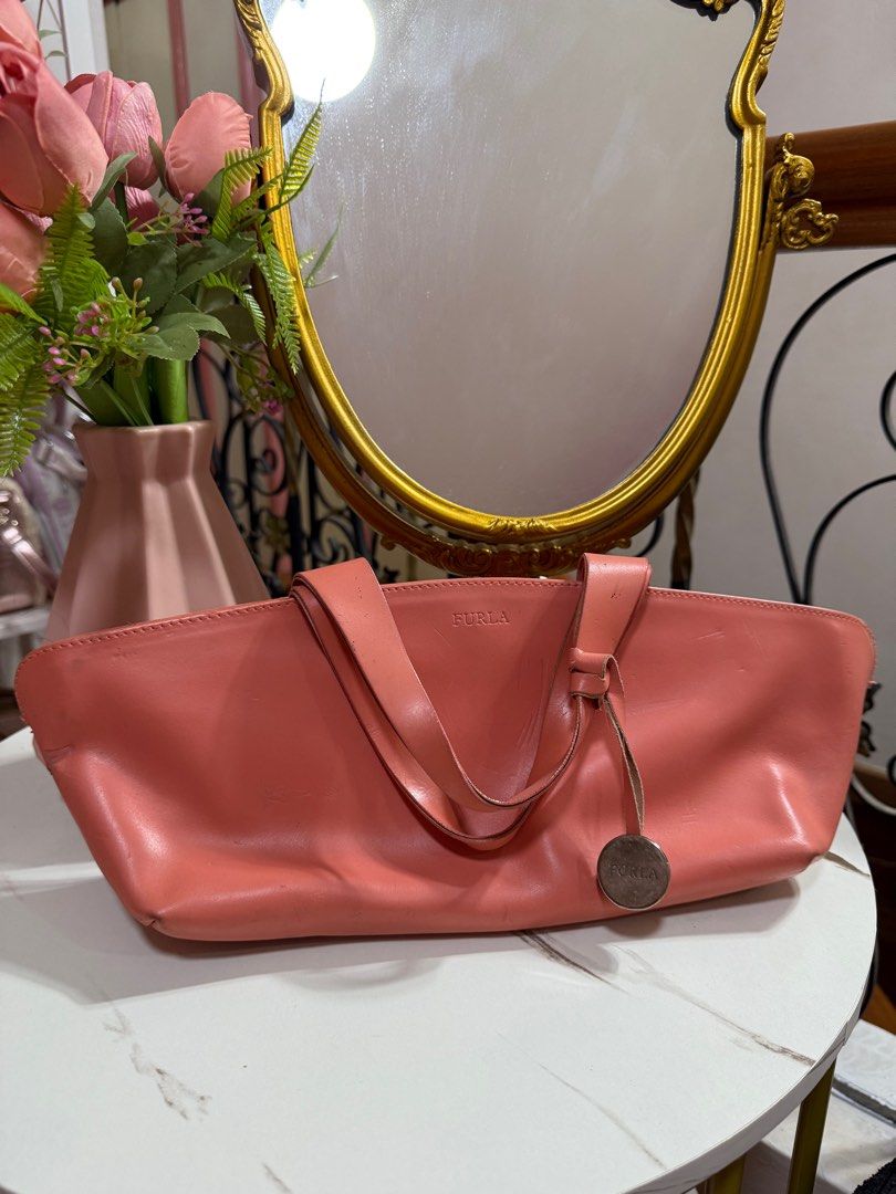 Furla Pink leather handbag (Auth) (Category: Luxury Bags & Wallets) located in Limay. Submitted by fashionshop248 (Listing ID 1380836556, Image 1). Description: Preloved Furla Bags! Authentic -flaws may mga dents dents -never nagamit -nadaganan ng mga gamit kaya nagka dents -malinis loob.