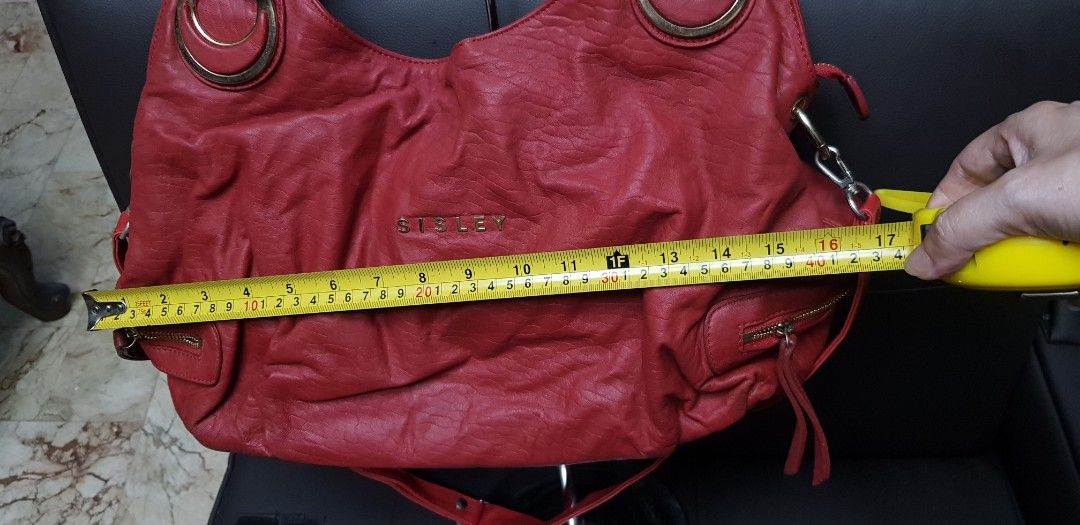 Red Sisley Shoulder, hobo bag (Category: Shoulder Bags) located in Quezon City. Submitted by practibagsplusmnl (Listing ID 1380828972, Image 2). Description: Red Sisley Shoulder, hobo bag. 2 way with replacement sling. Many exterior & interior pockets, compartments..
