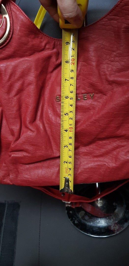 Red Sisley Shoulder, hobo bag (Category: Shoulder Bags) located in Quezon City. Submitted by practibagsplusmnl (Listing ID 1380828972, Image 3). Description: Red Sisley Shoulder, hobo bag. 2 way with replacement sling. Many exterior & interior pockets, compartments..