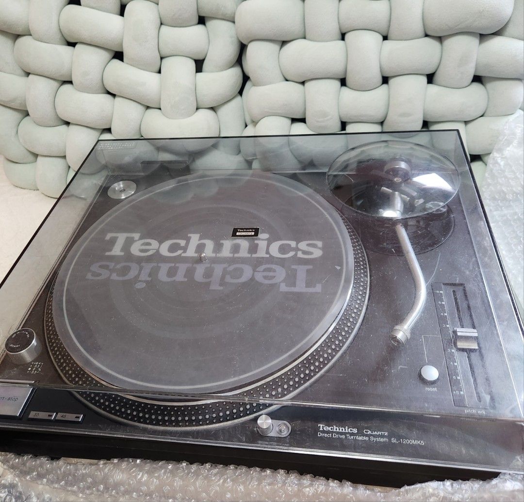 Technics SL-1200MK5 Turntable (Category: Soundbars, Speakers & Amplifiers) located in Manila. Submitted by racz03 (Listing ID 1380712064, Image 2). Description: New Arrival... Technics SL-1200MK5 Turntable in Excellent Working Condition.. Appearance Near Mint Condition.. With Slip Mat Rubber mat Sheet plastic mat 45 rpm adapter and Dust Cover.