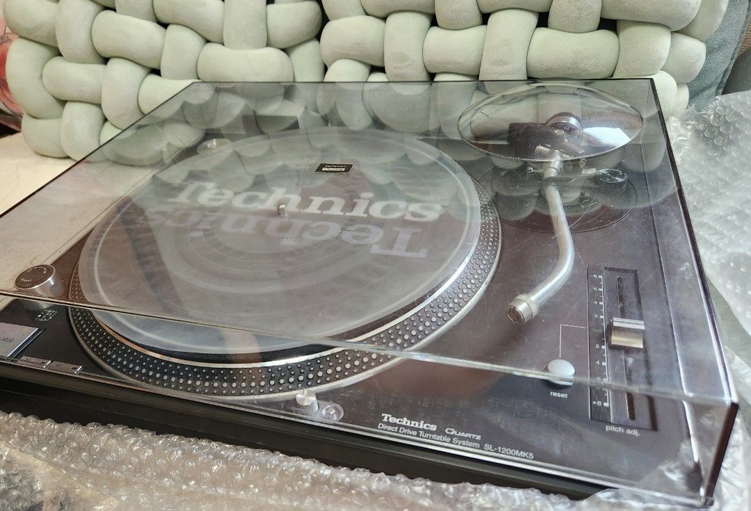 Technics SL-1200MK5 Turntable (Category: Soundbars, Speakers & Amplifiers) located in Manila. Submitted by racz03 (Listing ID 1380712064, Image 1). Description: New Arrival... Technics SL-1200MK5 Turntable in Excellent Working Condition.. Appearance Near Mint Condition.. With Slip Mat Rubber mat Sheet plastic mat 45 rpm adapter and Dust Cover.