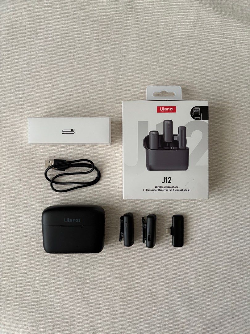 Ulanzi J12 Wireless Microphone (Category: Microphones) located in Pasay City. Submitted by brobadoobee (Listing ID 1380743632, Image 1). Description: Ulanzi J12 Wireless Microphone 🎙️ - 1 connector receiver for 2 microphones - Transmission distance: 10-20m - Noise reduction - Sound delay < 25ms - Signal to noise ratio: >70dB - 6 hours battery life - Battery capacity of transmitter: 80mAh - Charging case battery capacity: 800mAh - Charging case i