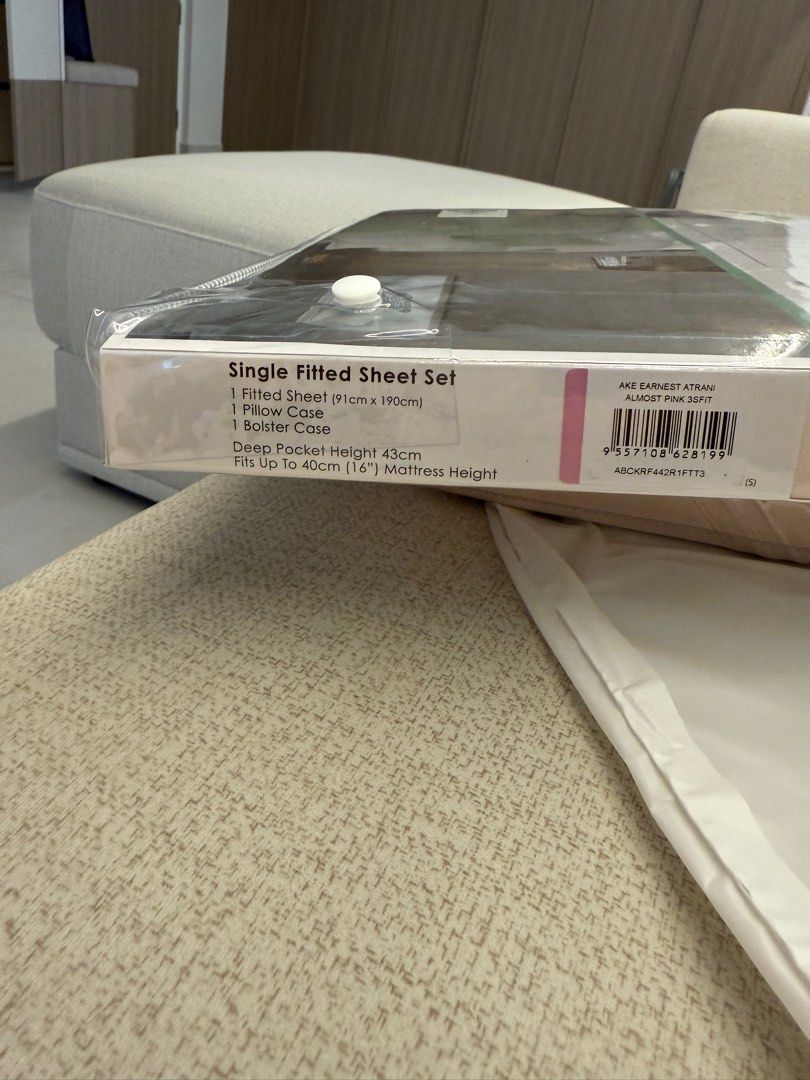 Sale-AKEMI Tencel Single bedsheet Fitted Set - Almost Pink (Category: Bedding & Towels) located in Singapore. Submitted by tan.lilian.165 (Listing ID 1380990071, Image 2). Description: Brand new AKEMI Tencel single fitted sheet set in Almost Pink. Includes 1 fitted sheet (91cm x 190cm), 1 pillow case, and 1 bolster case. Deep pocket height is 43cm and fits up to 40cm (16") mattress height. Made with Tencel Modal for a soft and comfortable feel. H