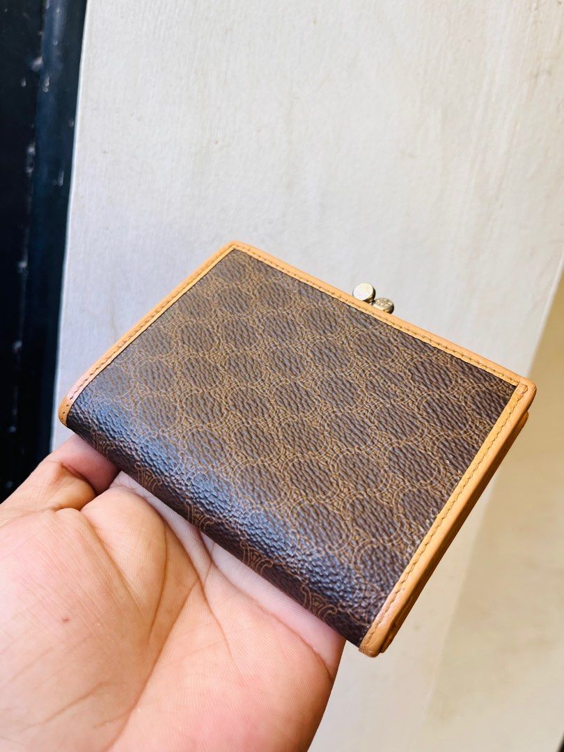 Authentic celine wallet (Category: Luxury Bags & Wallets) located in Ballesteros. Submitted by sat_b3 (Listing ID 1380919741, Image 2). Description: Authentic celin e bifold wallet Pls check all pics Retouched rin po yung gilid kc nagdark na yan dati.. Mejo may tallent tayo sa mga ganyan kaya ok na.. Issue: natanggal yung logo sa ibabaw ng lock.. 🫰🏻may leather akong logo ng celi ne baka kusto nyong ilagay ko.. 😊 ✅1,680 add sf.