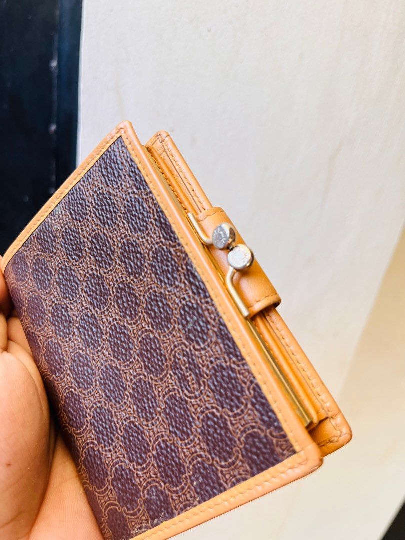 Authentic celine wallet (Category: Luxury Bags & Wallets) located in Ballesteros. Submitted by sat_b3 (Listing ID 1380919741, Image 3). Description: Authentic celin e bifold wallet Pls check all pics Retouched rin po yung gilid kc nagdark na yan dati.. Mejo may tallent tayo sa mga ganyan kaya ok na.. Issue: natanggal yung logo sa ibabaw ng lock.. 🫰🏻may leather akong logo ng celi ne baka kusto nyong ilagay ko.. 😊 ✅1,680 add sf.