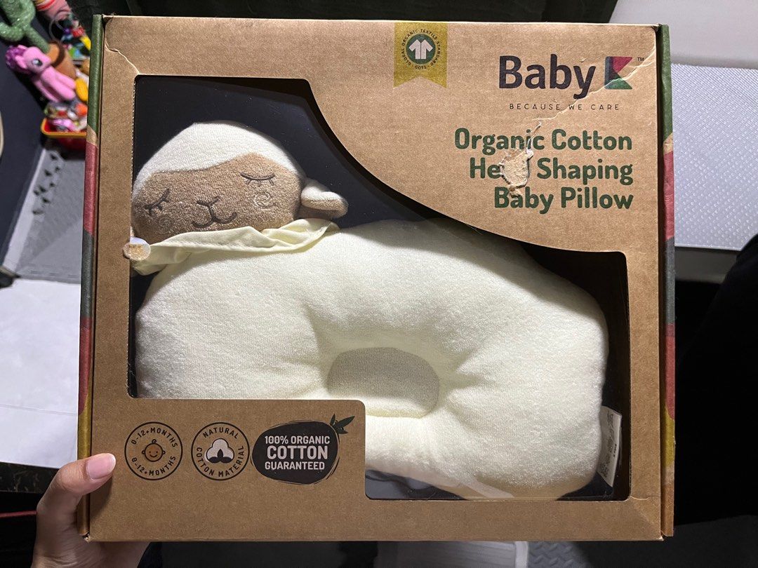 Baby K Organic Cotton Head Shaping Pillow (Category: Cots & Cribs) located in Singapore. Submitted by jas.wan (Listing ID 1381035446, Image 1). Description: Brand new Baby K organic cotton head shaping pillow. Designed to prevent flat head syndrome and provide comfort for your baby. Made with organic cotton and 3D air mesh for breathability. Comes in original packaging. Open to Negos..