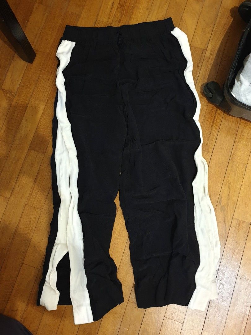 Black & White Side Split Pants (Category: Other Bottoms) located in Kuala Lumpur. Submitted by bevocado (Listing ID 1381047521, Image 1). Description: Black & White Side Split Pants. Sporty chic style.. very fashionable.