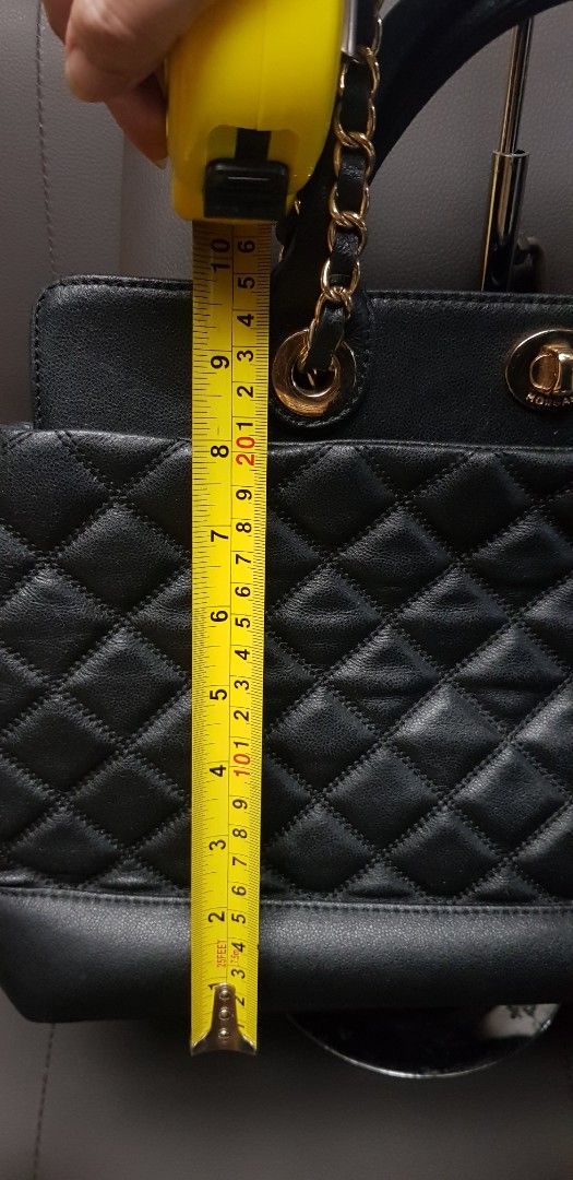 Black quilted Morgan 2-way bag (Category: Shoulder Bags) located in Quezon City. Submitted by practibagsplusmnl (Listing ID 1381038287, Image 3). Description: Black quilted Morgan 2-way bag; longer strap made of woven chain-leather. With 1 exterior, many interior pockets. Beautiful bag..