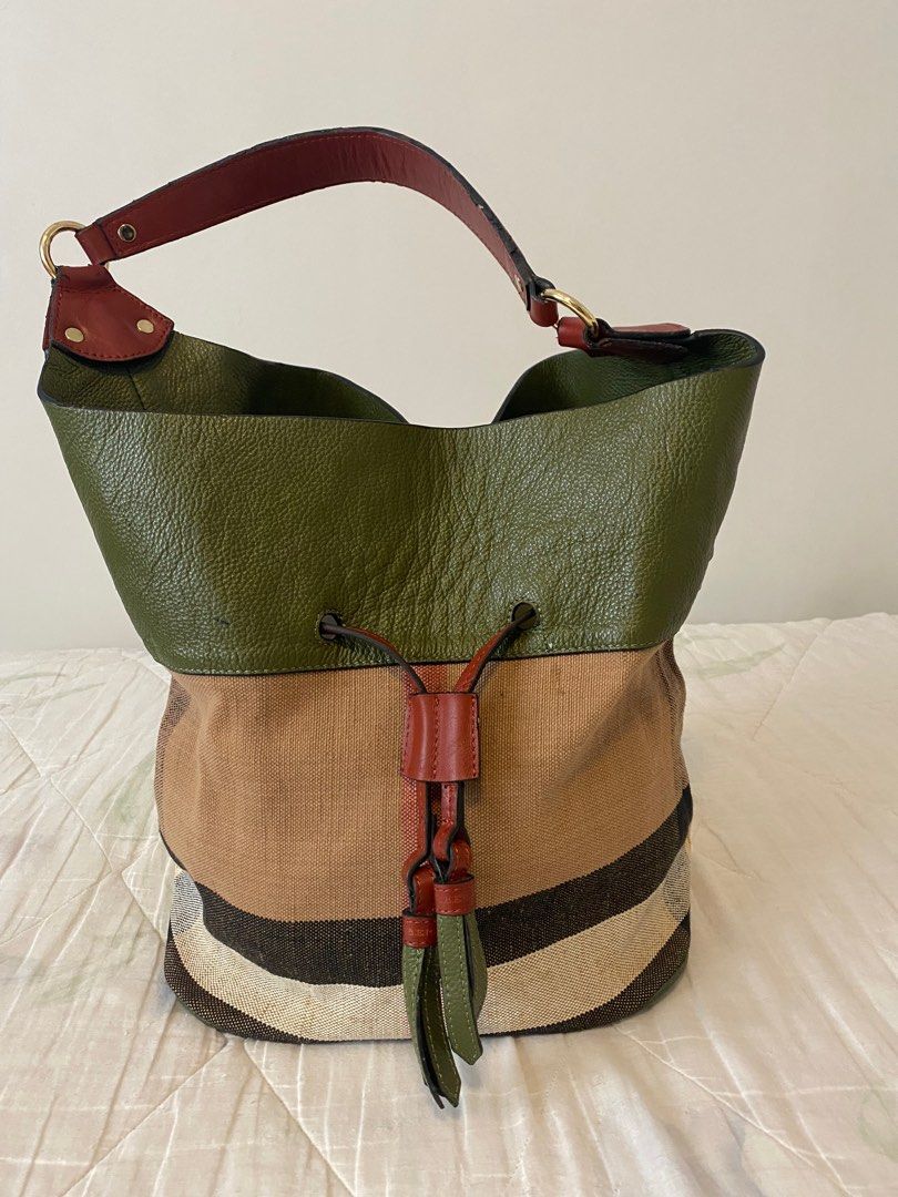 Burberry Bucket (Category: Luxury Bags & Wallets) located in Manila. Submitted by vintagefy (Listing ID 1380958663, Image 1). Description: Burberry Bucket , malinis , actual pictures posted. minimal flaws but not obvious ..further reduction sale ! .