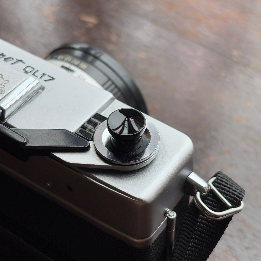 Camera Soft Shutter Button/Screw (Category: Other Photography Accessories) located in Singapore. Submitted by SurprisedPika (Listing ID 1381012965, Image 3). Description: Can be used on film cameras and Fujifilm cameras. Easy screw in and provides extra comfort when shooting with your camera. Also works as a conversation starter given how the colours pop or the unique designs like Spongebob & Pokeball! :) .
