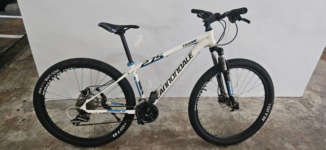 Cannondale Trail 6 Mountain Bike (Category: Bicycles) located in Singapore. Submitted by jamest77 (Listing ID 1380907582, Image 1). Description: - Cannondale Trail 6 mountain bike - Excellent condition - Equipped with disc brakes - Features WTB 27.5 tires (wide) - Ideal for trails and city riding - Well-maintained and ready for immediate use - Great value!.