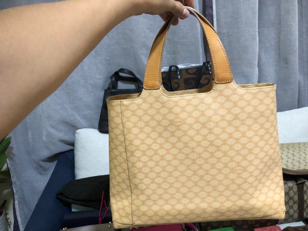 CELINE TAN STRUCTURED TOTE BAG ( RARE PIECE/ VINTAGE ) (Category: Luxury Bags & Wallets) located in Manila. Submitted by o_authentique (Listing ID 1381084604, Image 2). Description: VINTAGE CELINE TAN STRUCTURED TOTE BAG •Guarantee Authentic •Perfect for travel buddies •rare piece •Gold hardware •Coded •Rank A.