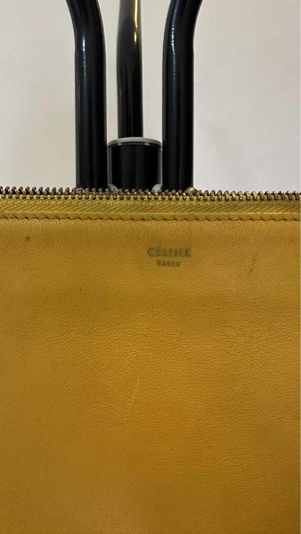 Celine Trio Authentic (Category: Luxury Bags & Wallets) located in Manila. Submitted by sanmer25 (Listing ID 1381000167, Image 2). Description: This Celine Trio has been my go to bag specially when I travel. It’s well used and served its purpose to me. I like the 3 zippered pockets because you can distribute your things strategically specially when traveling and commuting. The bag has some discolorations and stains and the logo is fading a bit bu
