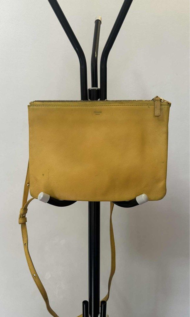 Celine Trio Authentic (Category: Luxury Bags & Wallets) located in Manila. Submitted by sanmer25 (Listing ID 1381000167, Image 1). Description: This Celine Trio has been my go to bag specially when I travel. It’s well used and served its purpose to me. I like the 3 zippered pockets because you can distribute your things strategically specially when traveling and commuting. The bag has some discolorations and stains and the logo is fading a bit bu