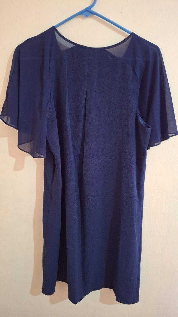 Deep Blue Ruffle Sleeve Dress (Category: Dresses) located in Baguio. Submitted by declutter_scarlet (Listing ID 1380968707, Image 2). Description: has a zipper on the side Free shipping Location: Baguio City DM me for more info Check out my profile for more listings.