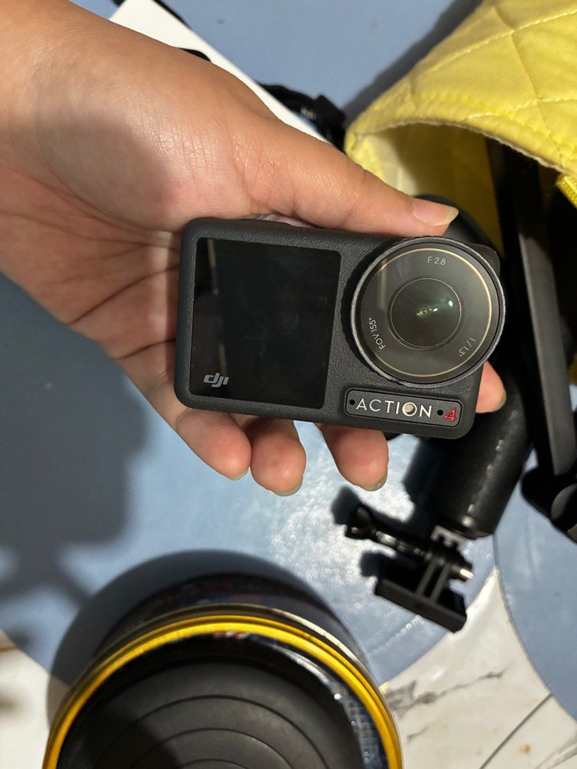 DJI Action 4 camera + loaded inclusions (Category: Cameras) located in Baguio. Submitted by teliagen098 (Listing ID 1380898923, Image 2). Description: No issues With telesin stand/holder With bike helmet holder and body holder With original connector With box With cases With one 🔋 6 mos lng nakeep since nabili pero hindi masyadong nagagamit —- no memory card, buy your own Perfect for vlogging, running, biking and swimming .