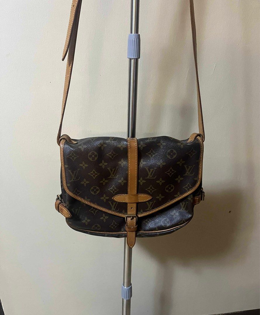Louis Vuitton Saumur Crossbody (Category: Luxury Bags & Wallets) located in Makati City. Submitted by martinoloco (Listing ID 1381035058, Image 3). Description: DM me for more photos. Guaranteed authentic, vintage bag from my mom.