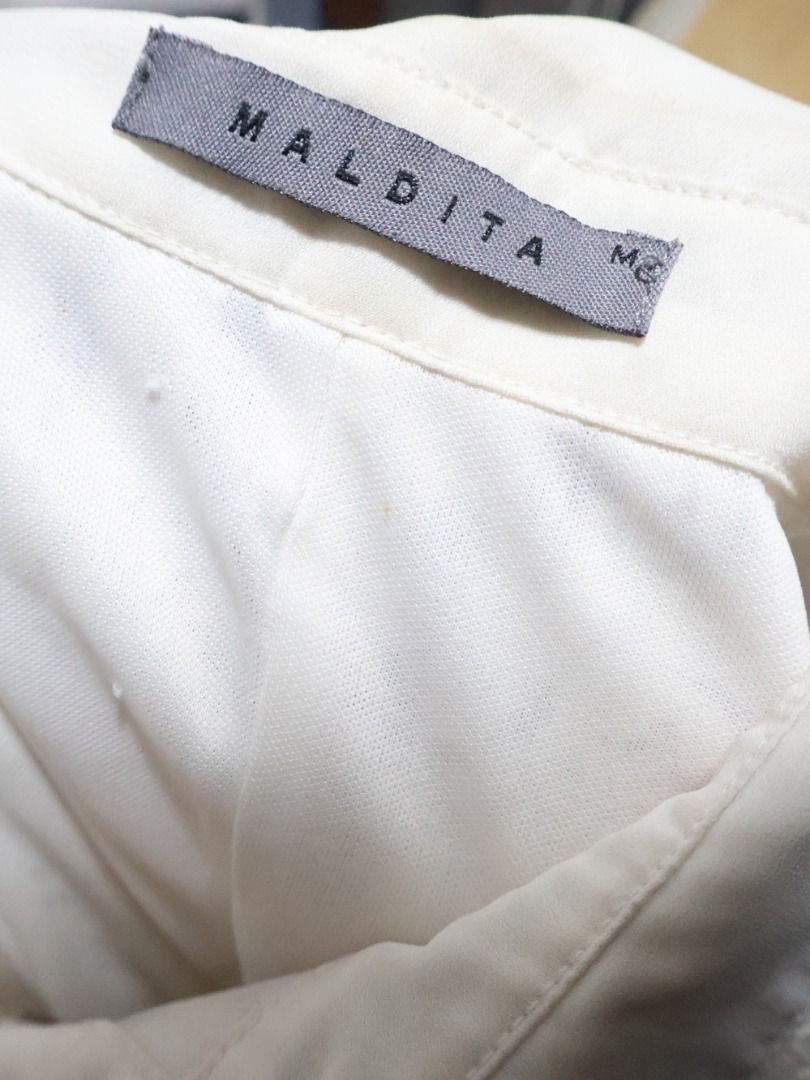 Maldita White Dress (Category: Dresses) located in Manila. Submitted by coldchai (Listing ID 1380985586, Image 3). Description: 📍Manila PM for inquiries and dimensions Shipping: Lalamove, JRS Express. Pay first then delivery. Shall be shouldered by the buyer.
