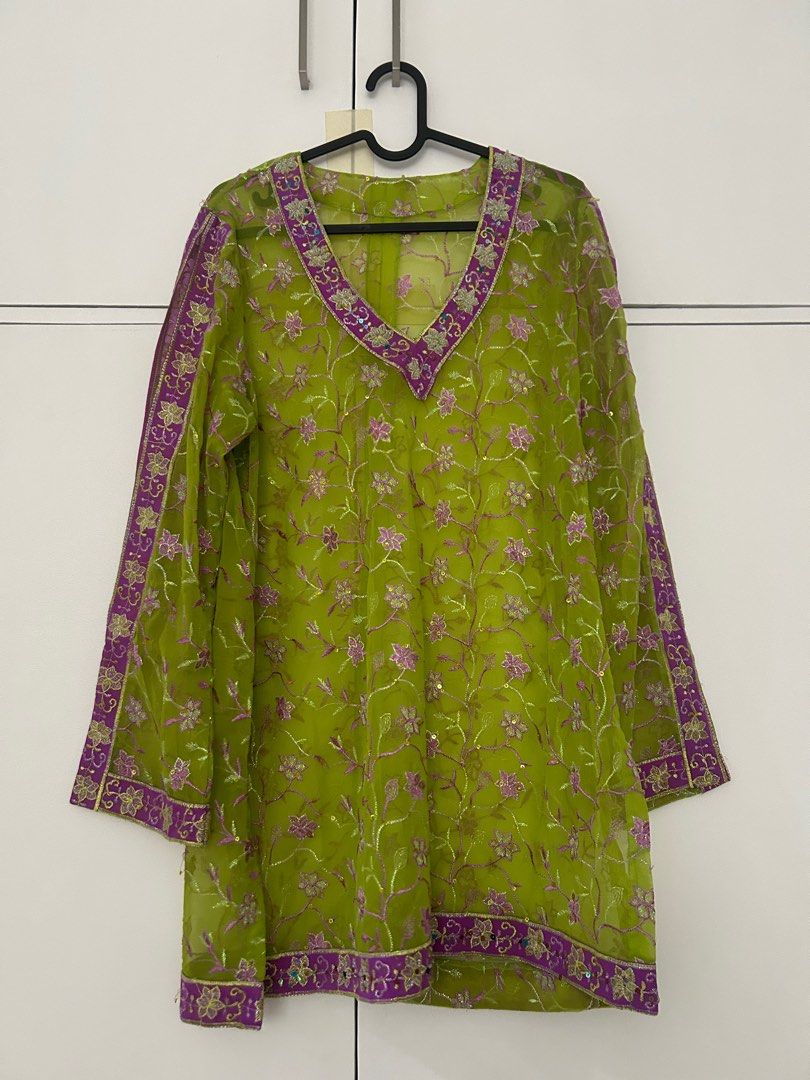 Perfect for ASEAN events coordinates (Category: Sets or Coordinates) located in Batangas. Submitted by mkjgb (Listing ID 1380940958, Image 1). Description: Purple and green coordinates long sleeve top and pants with floral design and sequins. One of a kind. With slits on the sleeves. Will fit medium to XL..