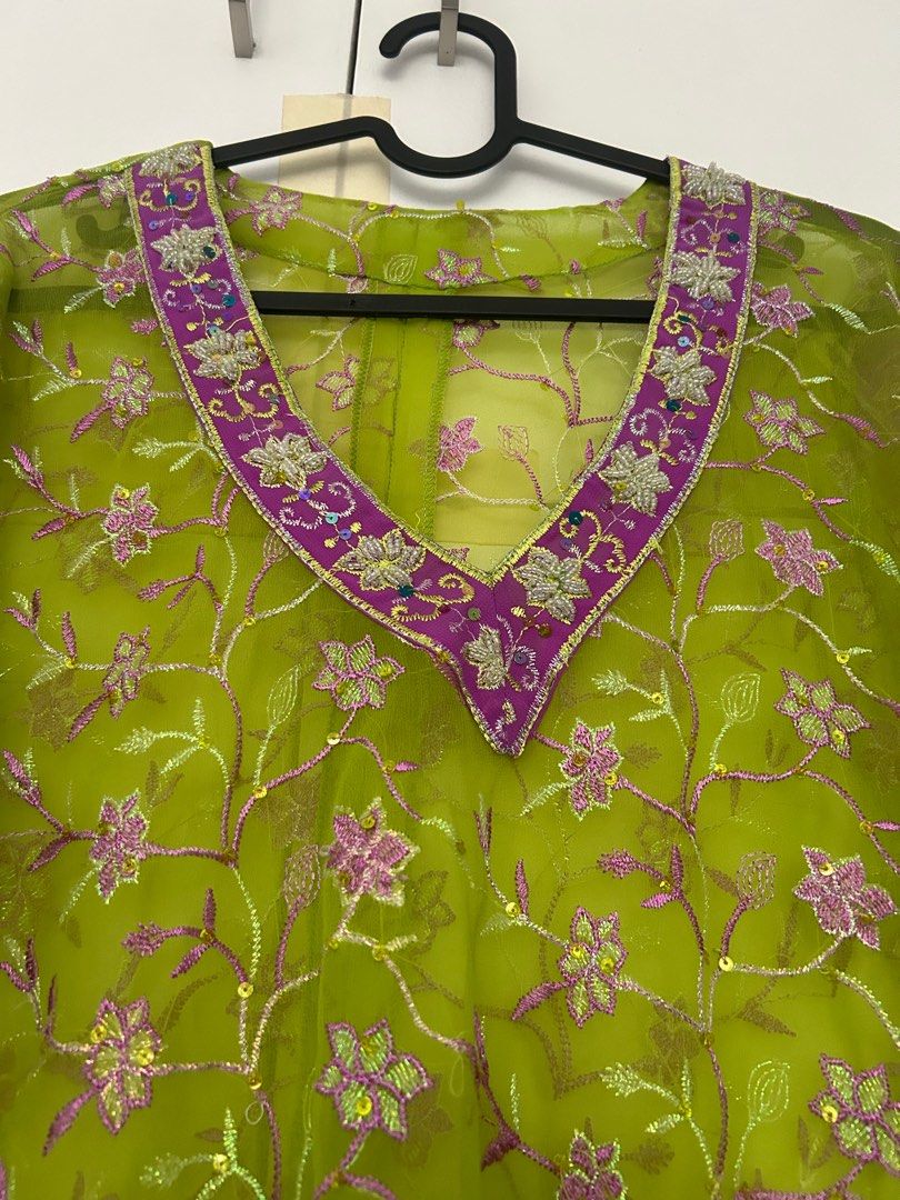 Perfect for ASEAN events coordinates (Category: Sets or Coordinates) located in Batangas. Submitted by mkjgb (Listing ID 1380940958, Image 2). Description: Purple and green coordinates long sleeve top and pants with floral design and sequins. One of a kind. With slits on the sleeves. Will fit medium to XL..