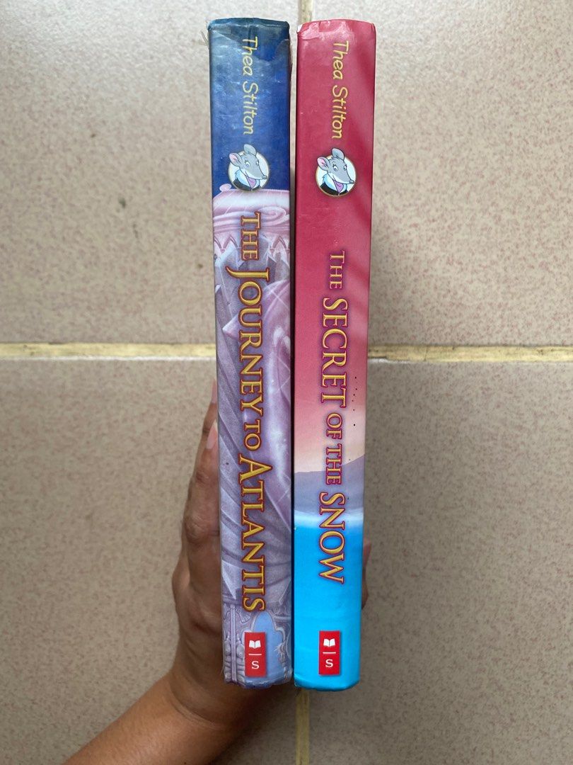 Preloved Thea Stilton books (Category: Storybooks) located in Cagayan de Oro. Submitted by kleaaa (Listing ID 1380922960, Image 3). Description: PRICE: 250 each FLAWS (PLEASE READ): Some of the books have plastic cover and name of owner written on the backs of the cover. MOP: Gcash, Cash (if meet up) MOD: J&T (shipping shouldered by buyer), meet up (Centrio Mall or SM uptown, Cagayan de Oro City).