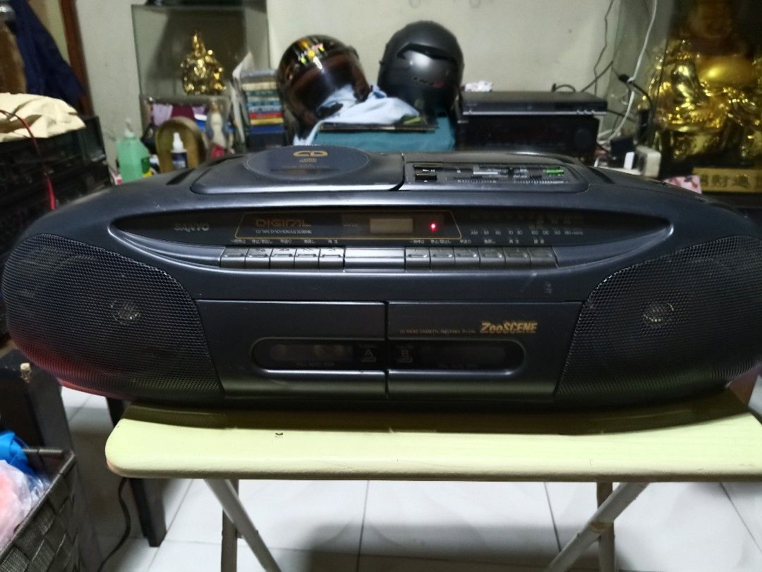 Sanyo CD Radio Cassette (Category: Portable Music Players) located in Pasay City. Submitted by marineljapansurplus (Listing ID 1380909327, Image 1). Description: Sanyo CD Radio Cassette-Corder PH-Z40 Good pang Cassette player Made in Malaysia Power: 100v 14W (need gamitan ng transformer) Tuner 📟: Complete all local FM/AM station Dual Cassette 📼: Both Working CD 📀: spinning only no sounds. Mic Mixing : can use as live-in Price: ₱1,200 Location: