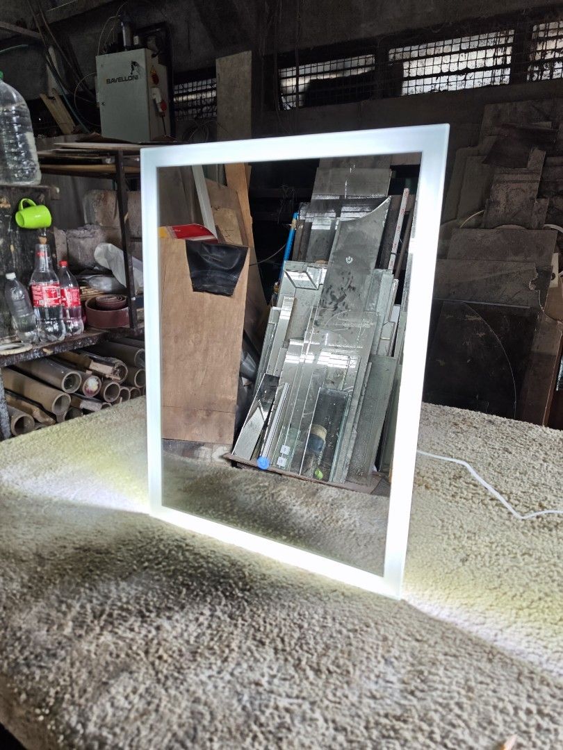 Table Top Led Mirror (Category: Mirrors) located in Malabon City. Submitted by mirrors.ph (Listing ID 1380904589, Image 3). Description: Frameless Table Top Led Mirror With front and back light using 6mm thick copper free mirror polished edges and adjustable back stand Size: 1.5ft W x 2ft H P4510 Made to order. 1 week production. Customize sizes are welcome..