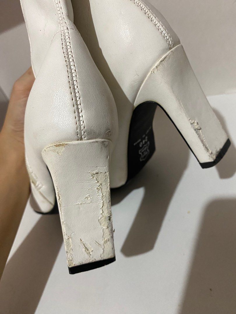 White Ankle Boots (Category: Boots) located in Manila. Submitted by _nnthl (Listing ID 1381009958, Image 3). Description: Needs some cleaning. Defects are seen on the heels part. Size 37 W.