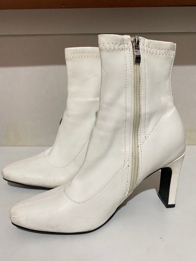 White Ankle Boots (Category: Boots) located in Manila. Submitted by _nnthl (Listing ID 1381009958, Image 2). Description: Needs some cleaning. Defects are seen on the heels part. Size 37 W.