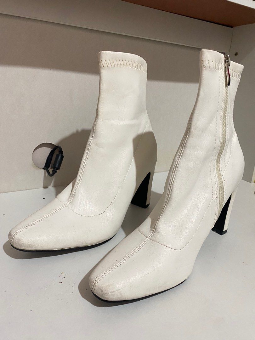 White Ankle Boots (Category: Boots) located in Manila. Submitted by _nnthl (Listing ID 1381009958, Image 1). Description: Needs some cleaning. Defects are seen on the heels part. Size 37 W.