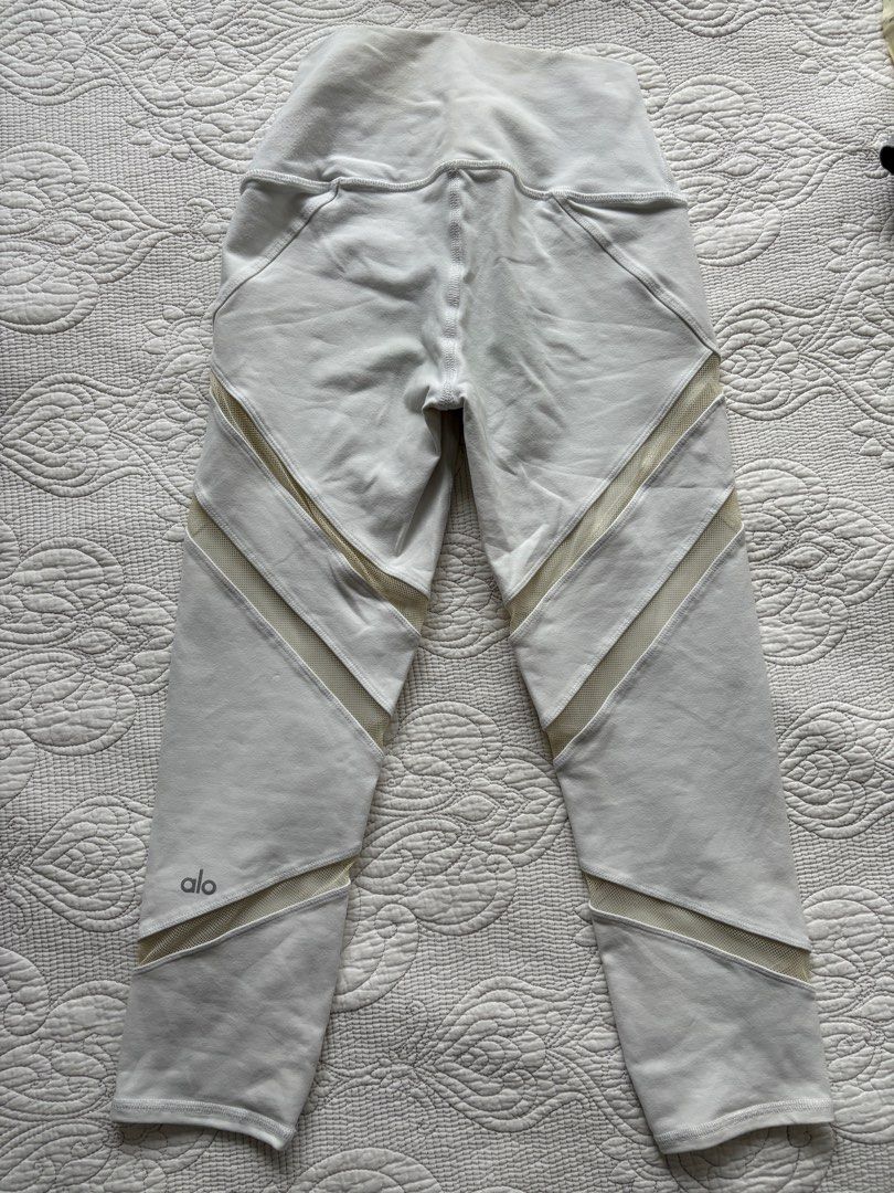 Alo Yoga White Mesh Panel Leggings - XXS (Category: Activewear) located in Singapore. Submitted by bunnbunn5566 (Listing ID 1381195658, Image 1). Description: These Alo Yoga leggings feature stylish mesh panel detailing. The size is XXS. Perfect for yoga, workouts, or casual wear. Made in Vietnam..