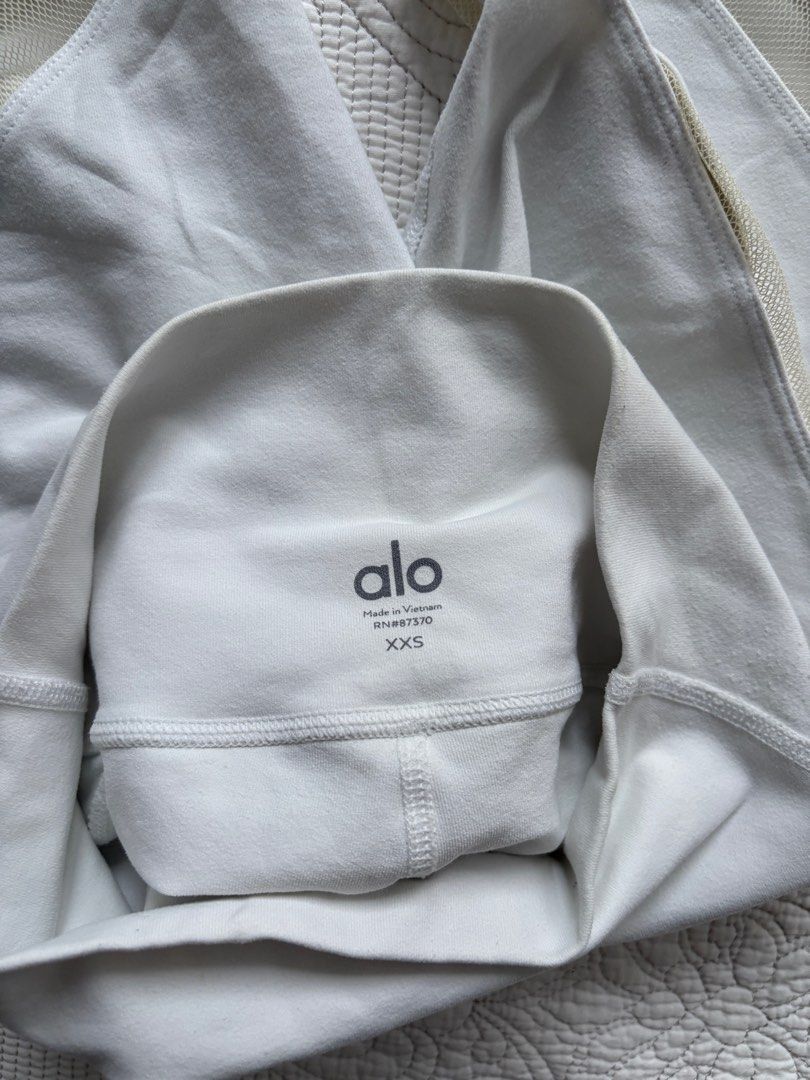 Alo Yoga White Mesh Panel Leggings - XXS (Category: Activewear) located in Singapore. Submitted by bunnbunn5566 (Listing ID 1381195658, Image 2). Description: These Alo Yoga leggings feature stylish mesh panel detailing. The size is XXS. Perfect for yoga, workouts, or casual wear. Made in Vietnam..