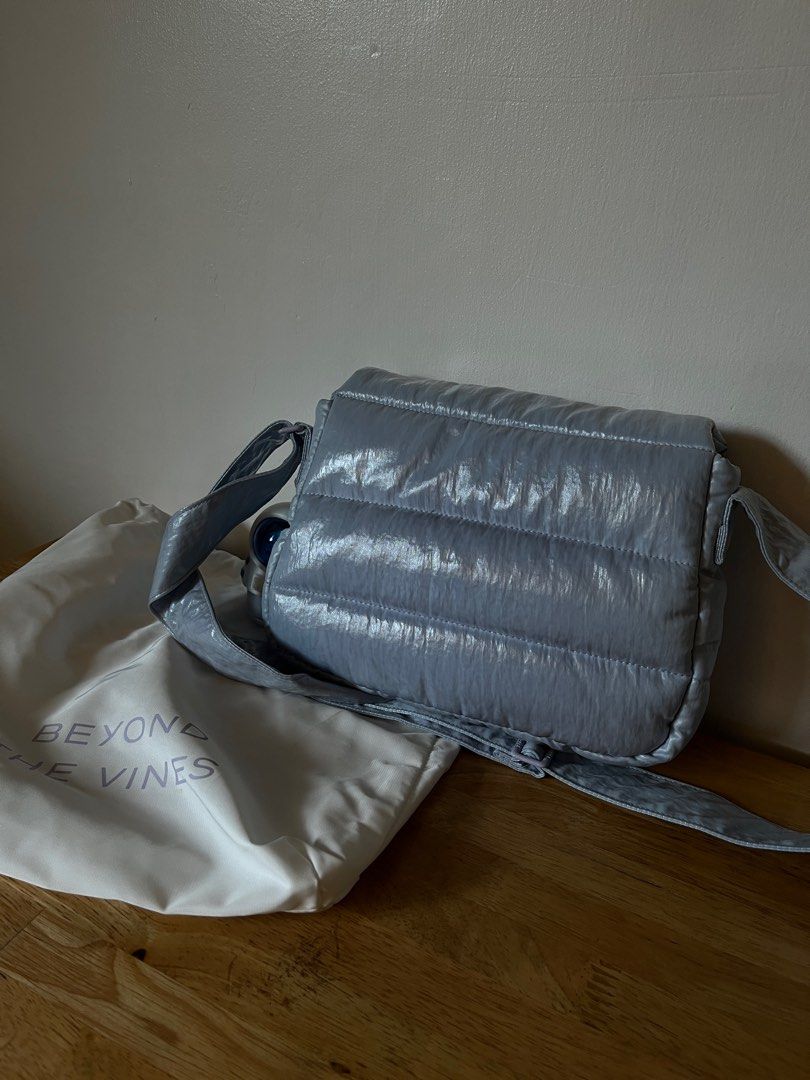 Authentic Beyond the Vines Glazed Lilac Poofy Bag (Category: Cross-body Bags) located in Quezon City. Submitted by bananabreadbaby (Listing ID 1381122352, Image 2). Description: Original price is around 4,400+. Still has original dustbag. No flaws except for a few loose stitches in the magnetic closure (check photo). Shade: Glazed Lilac 💜 Perfect on the go bag. Love that it’s water proof also and very easy to clean. RFS: decluttering. #BTV #Poof