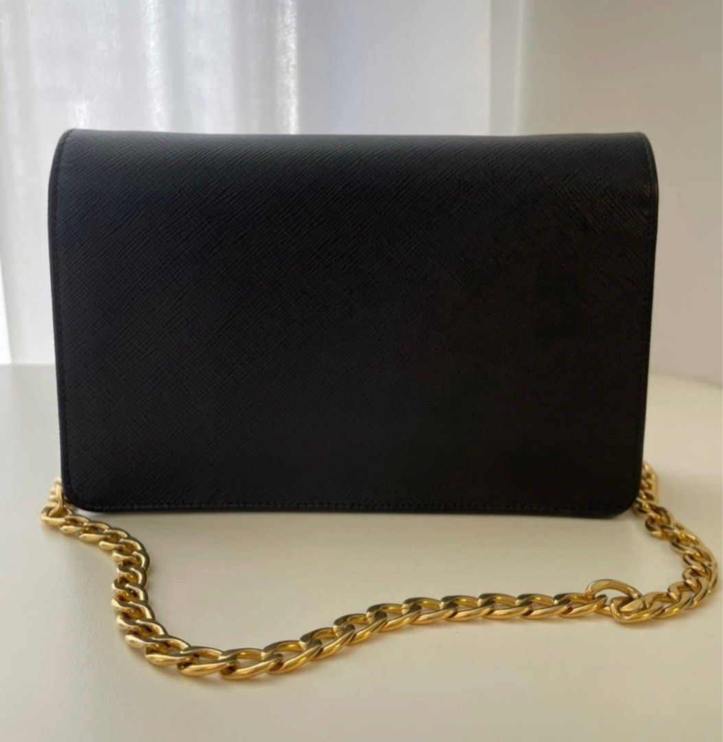 Authentic Prada Saffiano Wallet on chain (Category: Luxury Bags & Wallets) located in Quezon City. Submitted by jhaediah (Listing ID 1381177702, Image 2). Description: Saffiano gold woc preloved in excellent condition original Free pabitbit Korea .