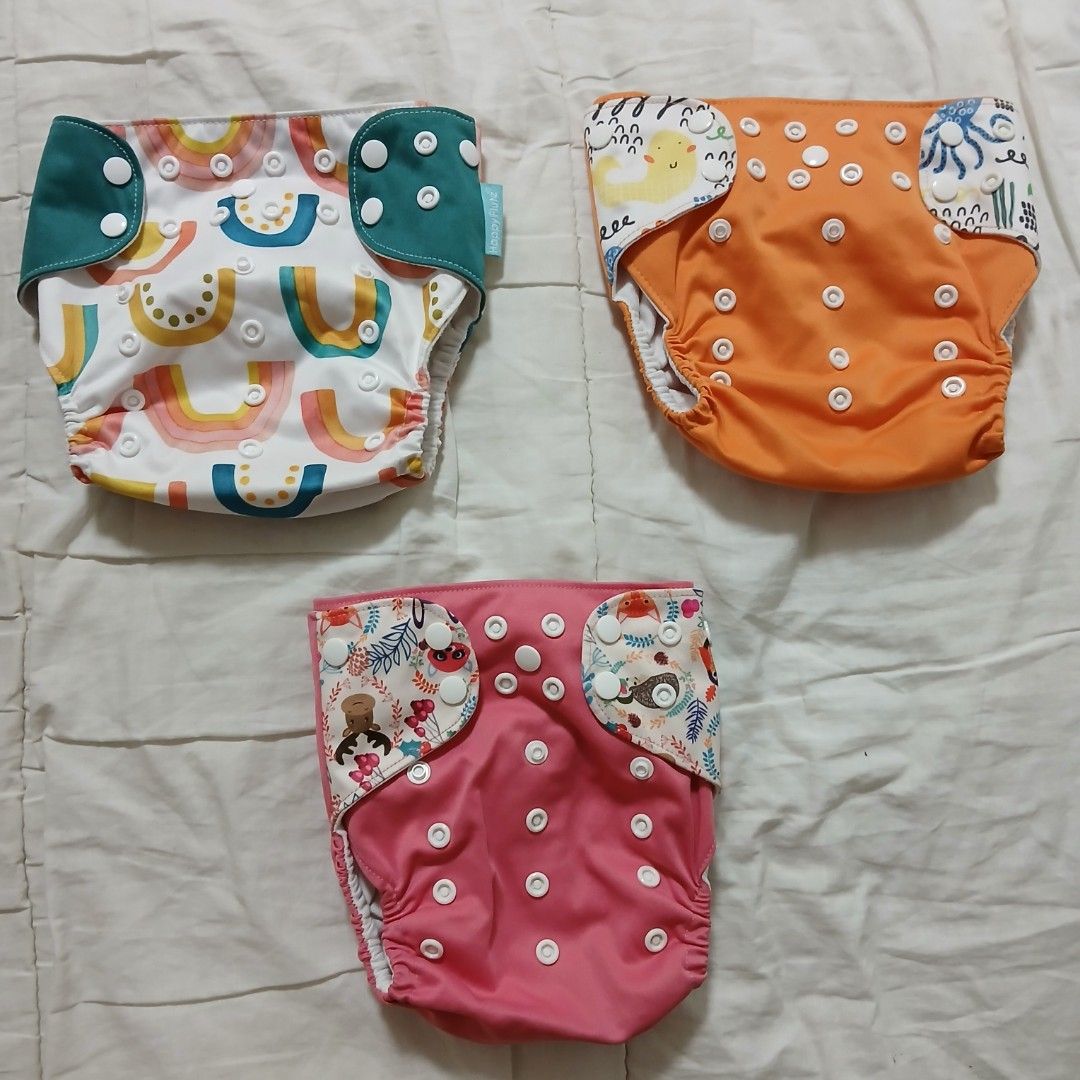 BABY CLOTH DIAPERS AND INSERTS (Category: Diapers & Baby Wipes) located in Taguig. Submitted by mayor_vito (Listing ID 1381087563, Image 1). Description: Slightly used 3 Happy Flute cds and 4 ABC by Zoey inserts *P129 for each item or P800 for take-all 7 pcs* -dark green and dark purple inserts have visible discoloration due to washing, so selling low -washed and kept pm me for more details thanks Loc: Taguig City mop: Gcash, Maya, BPI mod: sco, 