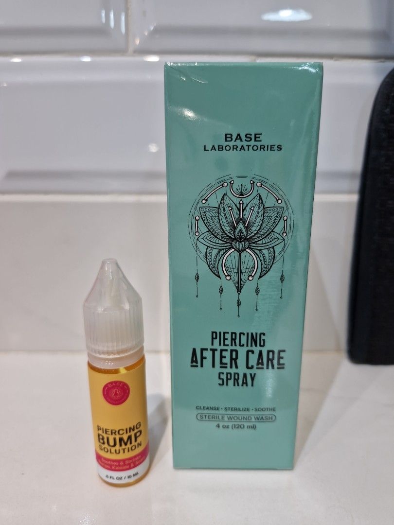 Base Laboratories Piercing Saline Spray and Piercing Bump Solution (Category: Ear Care) located in Pasig City. Submitted by adorebeautyph (Listing ID 1381184445, Image 1). Description: ‼️Selling as a bundle Bought in US After Care Spray is sealed (120 ml) Piercing Solution (15 ml) has been opened and used about 5 drops.