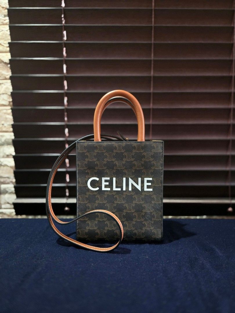 ON SALE!! Celine Mini Tote (Category: Luxury Bags & Wallets) located in Paranaque City. Submitted by dclutterqueen (Listing ID 1381118221, Image 2). Description: Celine Mini Vertical Cabas tote with Celine print Triomphe signature Monogram with 💯 leather trimmings and strap 🇯🇵 Acquired preloved from Japan 👜 Measures approximately 7 x 8 x 2 inches 🏍 Metro Manila and nearby areas only, serviceable via Lalamove, Grab Express and similar courier