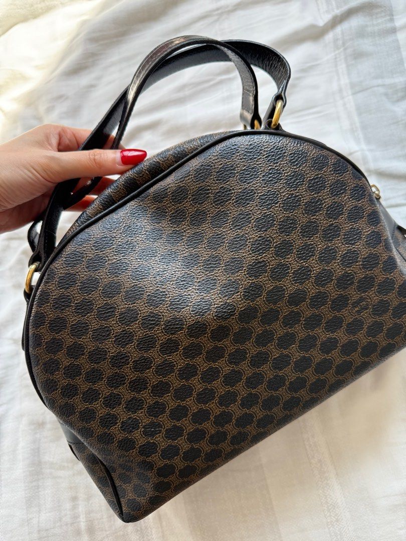 Celine vintage Macadam Top Handle Bag in Coated Canvas, Gold hardware (Category: Bags & Wallets) located in Singapore. Submitted by wendy.tan234 (Listing ID 1381094229, Image 3). Description: 100% authentic celine vintage bag. As it’s a vintage bag so there are definitely sign of use (please refer to pics). NOT FOR FUSSY BUYERS! Interior is still very clean! Will throw in a detachable long strap so you can use it as crossbody bag too. .