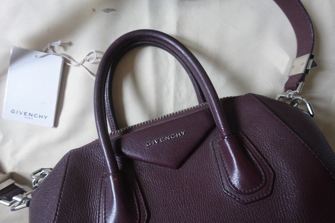 Givenchy Antigona Small Oxblood (Category: Luxury Bags & Wallets) located in Baguio. Submitted by stylehouseph (Listing ID 1381107982, Image 2). Description: ✨ Giv.en.chy Antigona Small in Ox blood ✨ Auth ✨ Rank A-AB ✨ First owner (bought from the US) ✨ Please check all details in pics ✨ No major flaws; signs of usage esp. on handle ✨ Valued @ ₱50k-₱100k ✨ ₱4x,xxx More photos can be sent thru message 🤍.