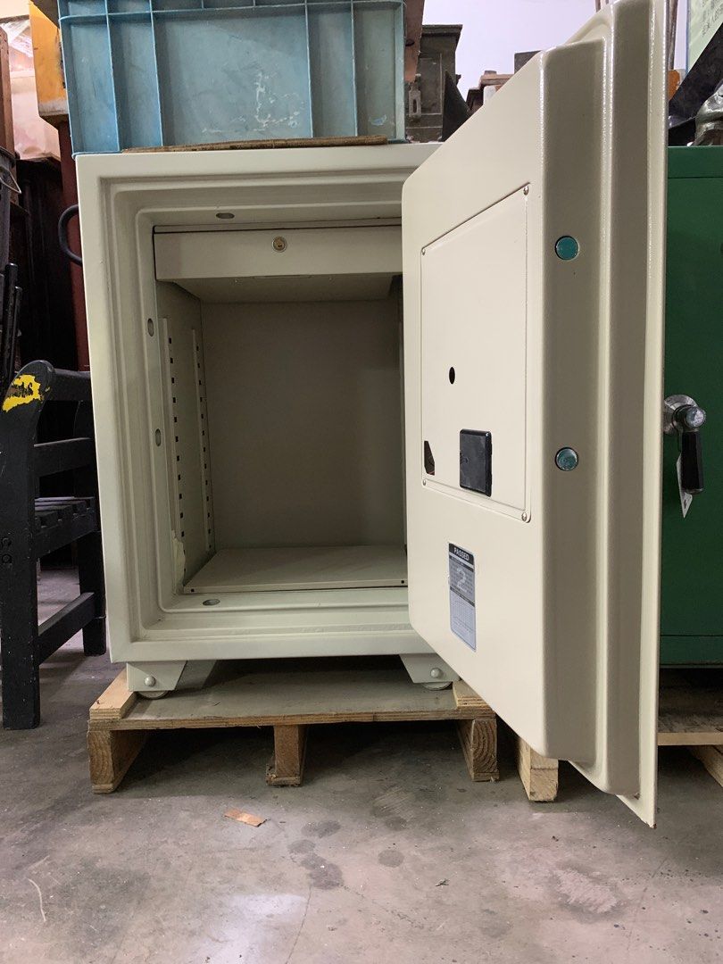 Heavy Duty Safe with Digital Lock (Category: Safe) located in Singapore. Submitted by davidsiah (Listing ID 1381142603, Image 2). Description: Heavy-duty safe features a digital keypad and key access. The interior offers ample storage space. Perfect for securing valuables. Comes with the original keys..