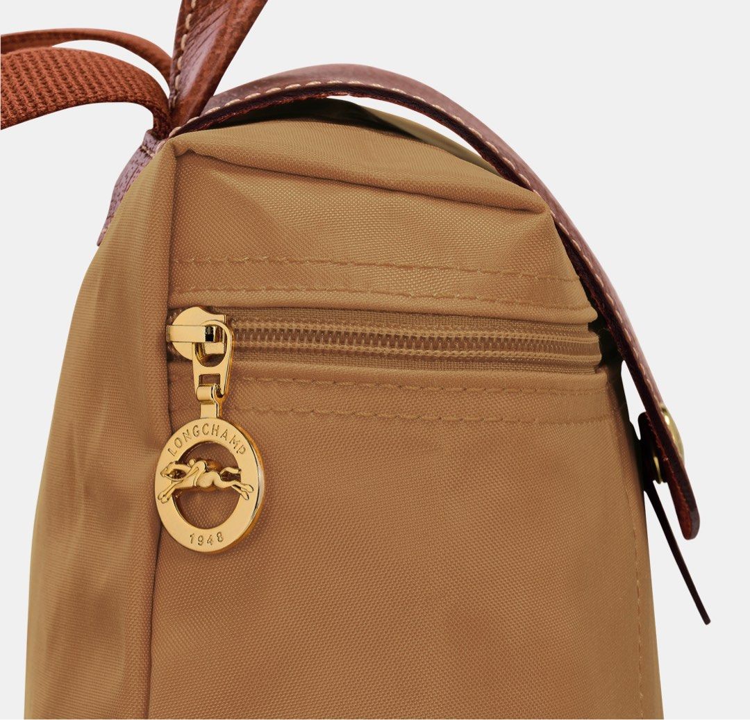 Longchamp Le Pliage Backpack in FAWN (Category: Backpacks) located in Bacolod City. Submitted by digitaldeclutter (Listing ID 1381119215, Image 3). Description: Longchamp Le Pliage Backpack Color: FAWN Brand new Dimensions : 26 cm (L - measured at the base of the bag) x 28 cm (H) x 10 cm (W) ✨I do not sell counterfeit items ✨No swaps. No meet-ups. ✨J&T or LBC COP/COD c/o buyer ✨MOP: BPI/BDO/Gcash ✨All sales are final.