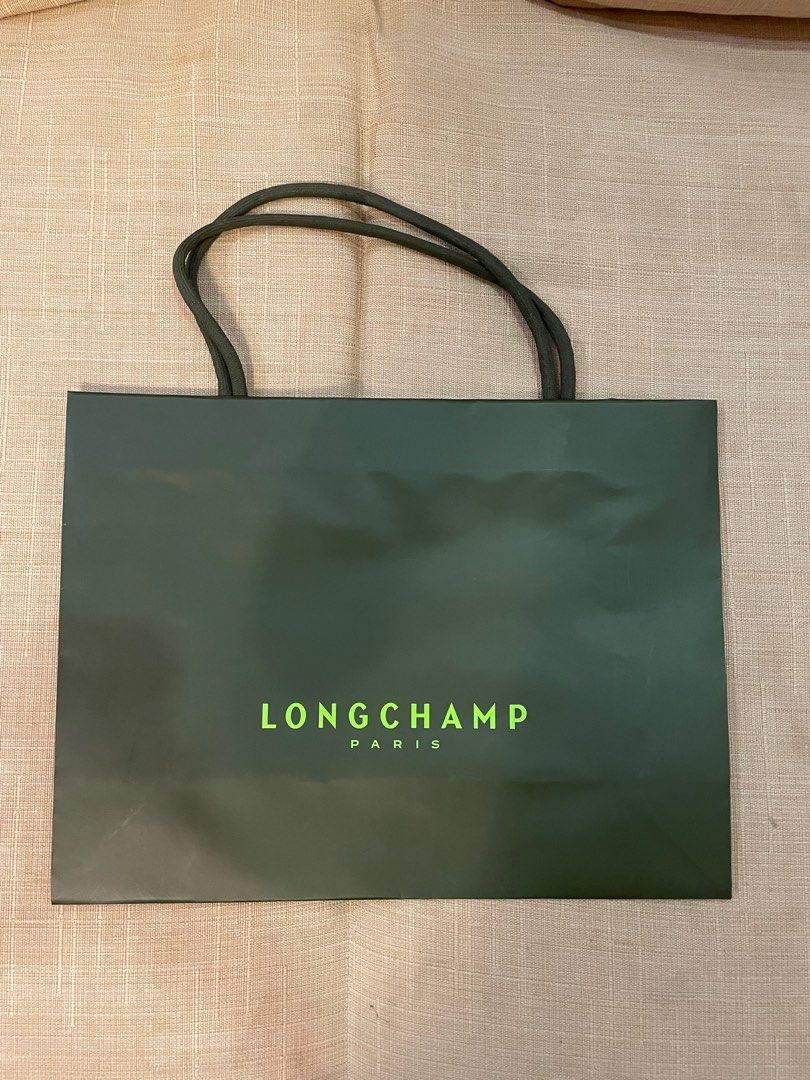 Longchamp paperbag (Category: Luxury Bags & Wallets) located in Cebu City. Submitted by kiki_closet168 (Listing ID 1381155202, Image 1). Description: Size 13.75in x 10.25in x 4.5in.