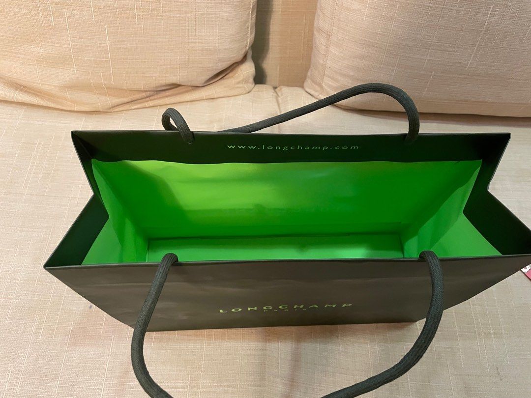 Longchamp paperbag (Category: Luxury Bags & Wallets) located in Cebu City. Submitted by kiki_closet168 (Listing ID 1381155202, Image 3). Description: Size 13.75in x 10.25in x 4.5in.