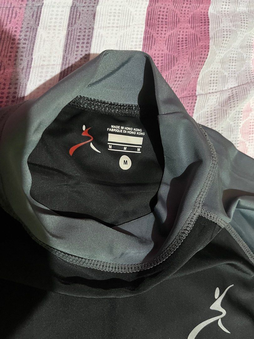Rash Guard Longsleeves (Category: Rash guard) located in Pasig City. Submitted by uriel0021 (Listing ID 1381208752, Image 3). Description: Selling: Unused Rash Guard Color: Black/Grey Size: Medium (but fits more like XS/S due to small sizing) Please see measurements in the photos. Never worn..
