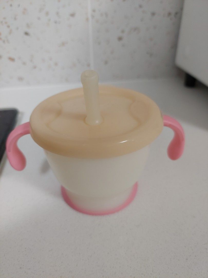 Richell Baby Sippy Cup with Handles (Category: Weaning & Toddler Feeding) located in Singapore. Submitted by cjean.10 (Listing ID 1381087703, Image 1). Description: - Richell AQULEA straw training cup. - Sippy cup with straw and handles. - Designed for easy gripping. - Excellent condition. - Removable lid for easy cleaning. - Good for babies learning to drink liquid..