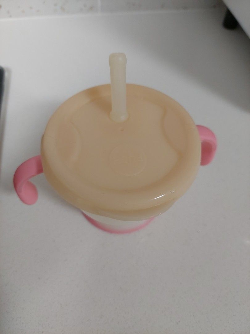 Richell Baby Sippy Cup with Handles (Category: Weaning & Toddler Feeding) located in Singapore. Submitted by cjean.10 (Listing ID 1381087703, Image 2). Description: - Richell AQULEA straw training cup. - Sippy cup with straw and handles. - Designed for easy gripping. - Excellent condition. - Removable lid for easy cleaning. - Good for babies learning to drink liquid..